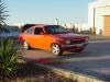 Robert's clean orange coupe  